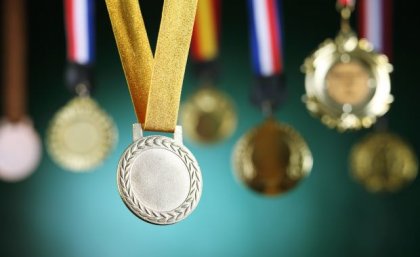 Image: Adobe A silver, bronze and gold medal